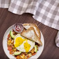First Watch Farmhouse Hash with seasoned potatoes, bacon, onion, tomatoes, cheese, and eggs – 2025 menu