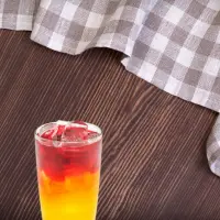 "First Watch Morning Meditation juice with orange, lemon, turmeric, beet, and ginger – 2025 menu drink"