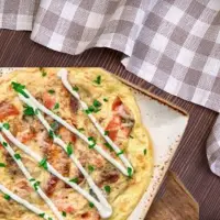 "First Watch Roasted Vegetable Frittata with zucchini, mushrooms, peppers, and Parmesan – 2025 menu"