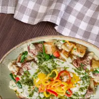 "First Watch Steak and Egg Hash with seasoned potatoes, peppers, onions – 2025 breakfast menu"