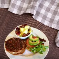 "First Watch Veggie Burger with lettuce, tomato, and onion – 2025 menu"